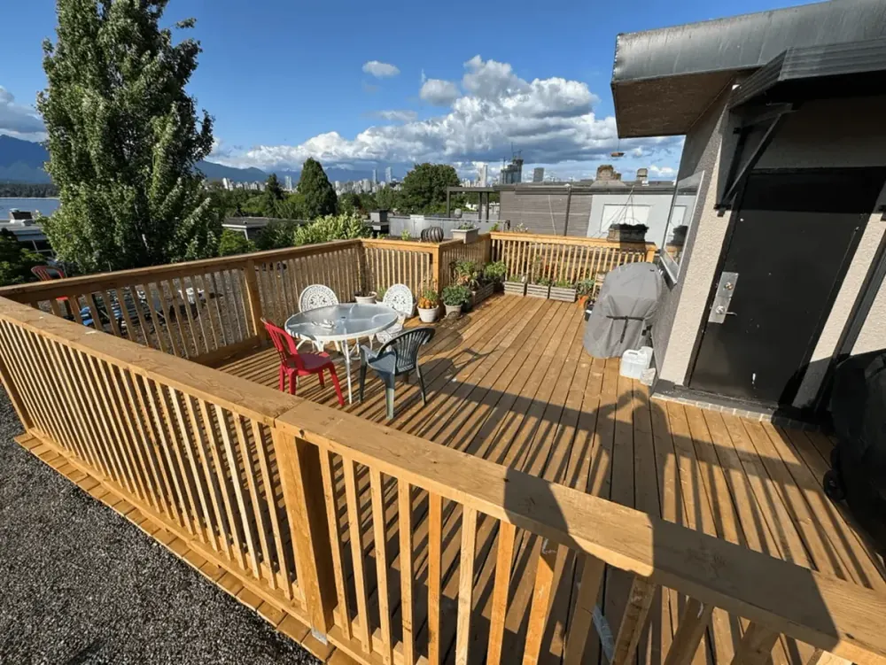 Cedar deck with wood railings and a view of the North Shore mountains